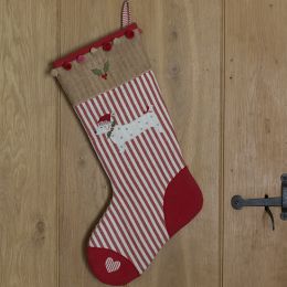 Handmade Christmas stocking on red and white striped cotton with an embroidered festive spotty dog detail. 