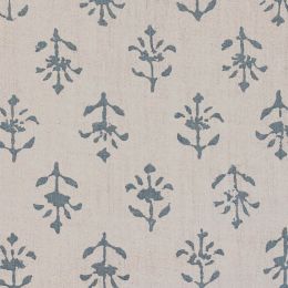 linen fabric printed all over with a blue block print floral design