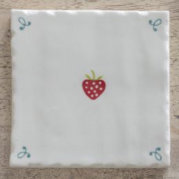 hand made and hand painted strawberry design tile