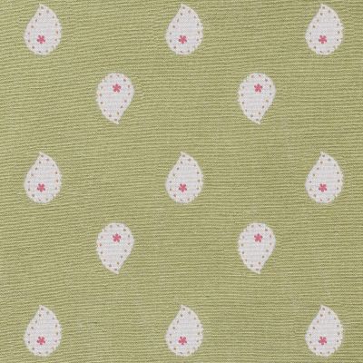 bright green cotton fabric printed with cream, yellow and pink paisley inspired motif