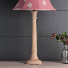 Hand-carved wooden lamp base, with a whitewash finish.