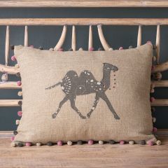linen cushion with charcoal applique camel and pom pom edge